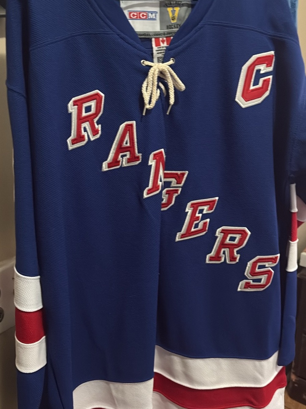 CCM Blue Rangers Hockey-Style V-Neck Sweater with Red & White Accents